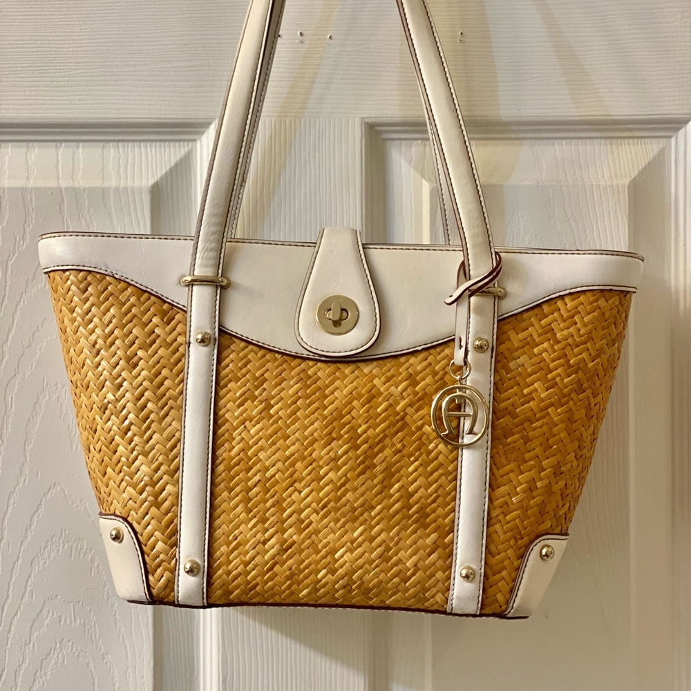 SOLD SOLD OUT Aigner wicker and leather purse, 14 by 9 inches clean interior